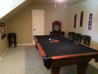 interior of a room with a pool table