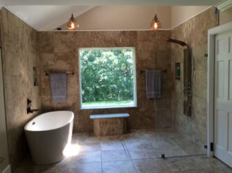 Beautiful remodeled bathroom with large window