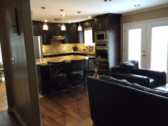 Beautifully remodeled kitchen with bar counter top
